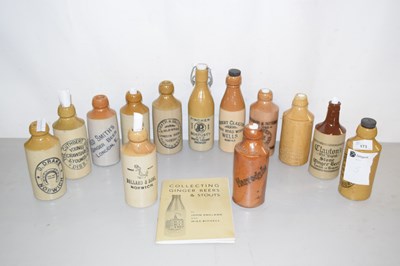 Lot 173 - A collection of stone ware ginger beer bottles...