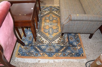 Lot 265 - A 20th Century geometric pattern floor rug