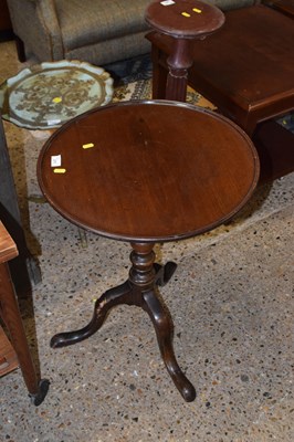 Lot 277 - A wine table with dished mahogany top, turned...