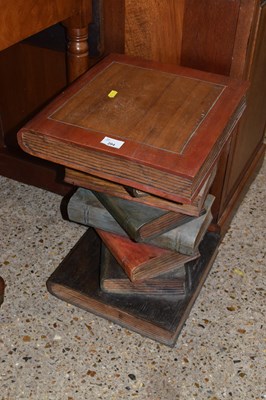 Lot 294 - A modern lamp table formed as a stack of books