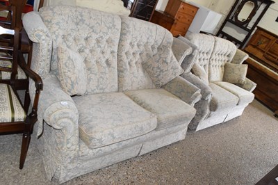 Lot 318 - A pair of floral upholstered two seater sofas