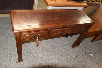 Lot 323 - A 20th Century hardwood three drawer side table