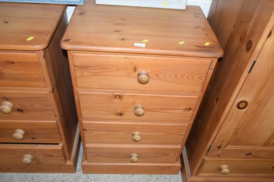 Lot 335 - A modern pine four drawer chest with turned...