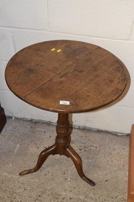 Lot 223 - A Georgian oak circular top wine table on...