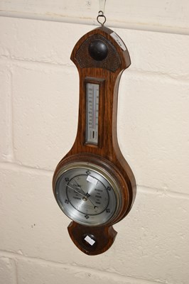 Lot 249 - A small oak framed barometer