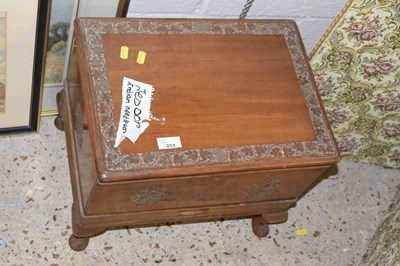 Lot 253 - A carved hardwood sewing box
