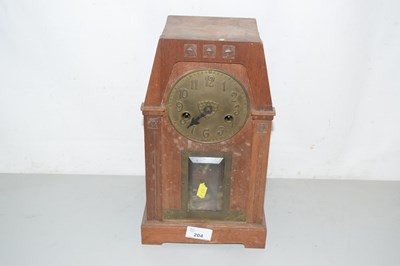 Lot 204 - A late 19th Century brass mounted mantel clock...