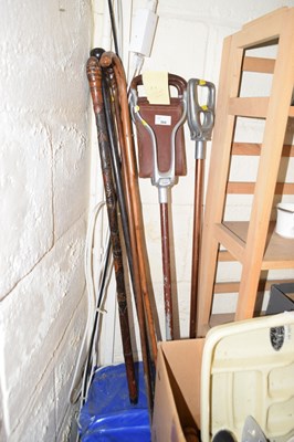 Lot 504 - Two shooting sticks and four walking sticks