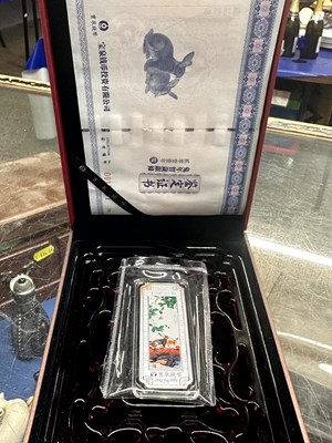 Lot 115 - A Chinese 20g pure silver ingot in...
