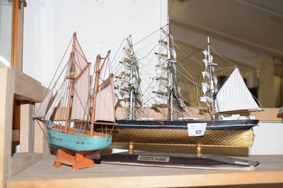 Lot 629 - A model of the Cutty Sark and a small model of...