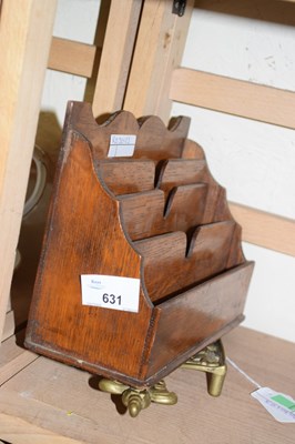 Lot 631 - Wooden letter rack and brass iron shaped trivet