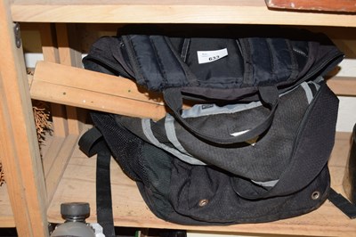 Lot 633 - A backpack and assorted contents