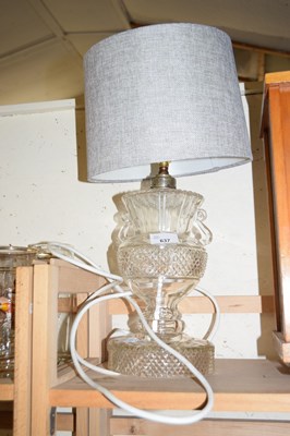 Lot 637 - A cut glass table lamp