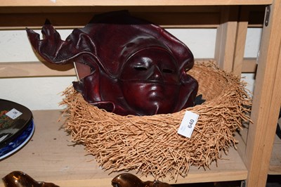 Lot 640 - A Venetian styled leather mask, a straw basket...