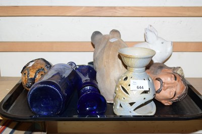 Lot 644 - Blue glass and model pigs