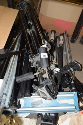 Lot 664 - A large quantity of assorted camera tripods