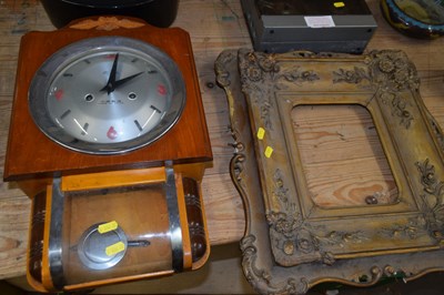 Lot 800 - A vintage Chinese wall clock and a gilt...