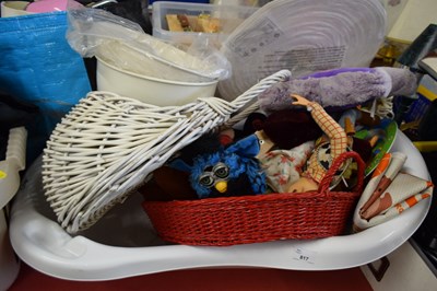 Lot 817 - A baby bath filled with assorted toys, baskets...