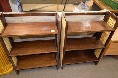 Lot 850 - A pair of folding bookcase stands
