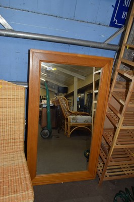 Lot 861 - A pine framed wall mirror