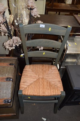 Lot 897 - A pine and rush seated chair