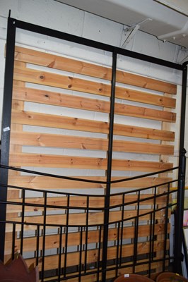 Lot 906 - A metal and pine double bed frame