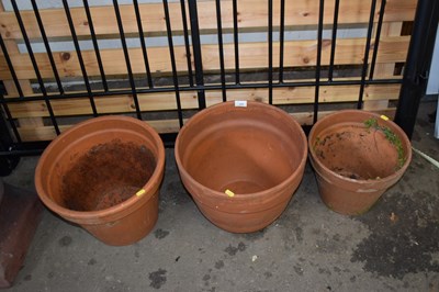 Lot 908 - Three terracotta plant pots