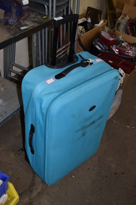 Lot 932 - A suitcase with ski jacket and trousers