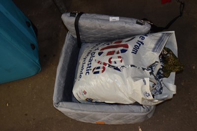 Lot 935 - A pet bed and quantity of clothing