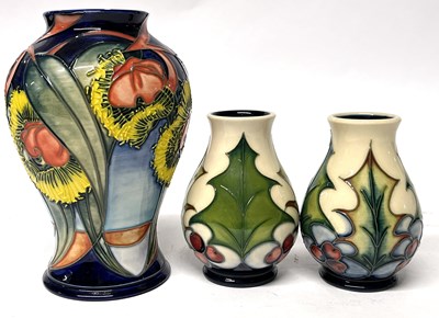 Lot 300 - Small pair of Moorcroft baluster shape vases...