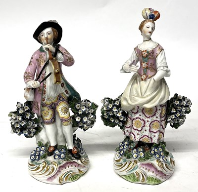 Lot 304 - A Chelsea Derby figure of a musician together...