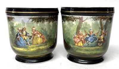 Lot 318 - Two continental porcelain jardinieres with...
