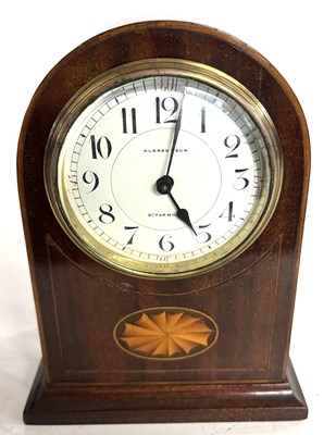 Lot 332 - An Edwardian mantel clock with inlaid shell...