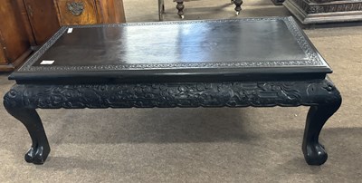 Lot 363 - An Oriental ebonised rectangular coffee table...