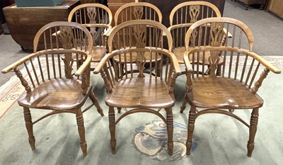 Lot 385 - A set of six 20th Century elm seated Windsor...