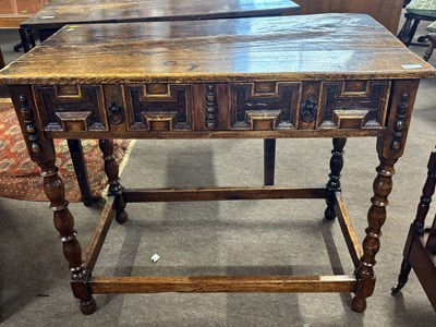 Lot 395 - A Jacobean oak single drawer side table with...