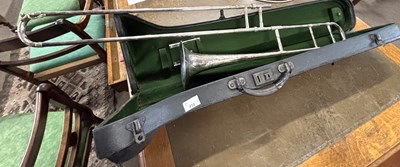 Lot 410 - A Boosey & Co, London silver plated trombone