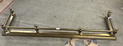 Lot 417 - A Victorian brass fire fender with railed...