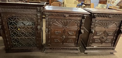 Lot 357 - A Victorian Gothic oak bookcase cabinet with...