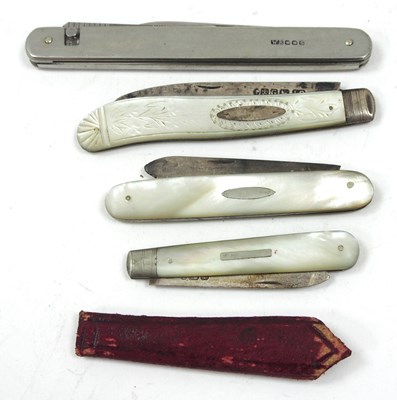 Lot 161 - A group of three mother of pearl handled fruit...