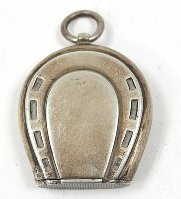 Lot 178 - A Victorian silver novelty horseshoe vesta...