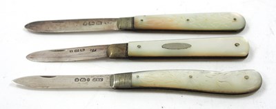 Lot 191 - A group of three silver folding bladed mother...