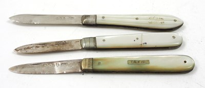 Lot 193 - A group of three silver and mother of pearl...