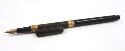 Lot 196 - A vintage fountain pen, the nib engraved...