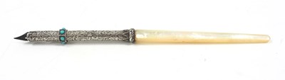 Lot 197 - A vintage white metal and mother of pearl...