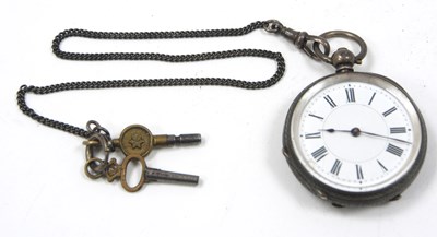 Lot 225 - A silver open face pocket watch with chain and...