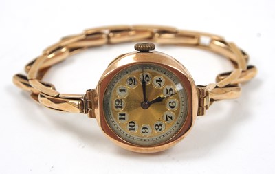 Lot 242 - A 9ct gold case ladies watch on expanding...