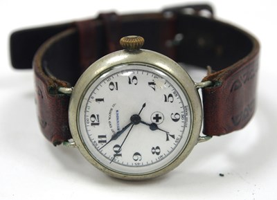 Lot 253 - A West End Watch Company military medics watch,...
