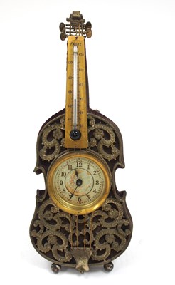 Lot 266 - A British United Clock Company violin shaped...