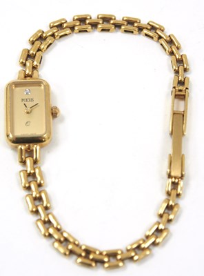 Lot 241A - A yellow metal Focus quartz wrist watch,...